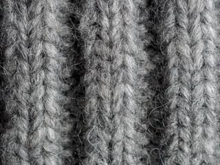 A textured gray knitted fabric ideal for cozy pieces and stylish clothing