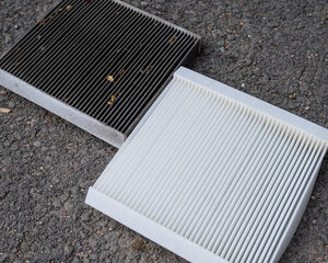 Dirty and new car cabin air filters. Timely car service. 