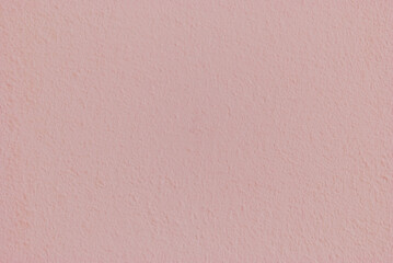 Soft pink dry wall texture as background