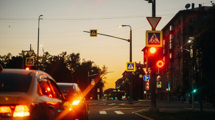 The sight of evening traffic beautifully illuminated at sunset captivates the viewers senses