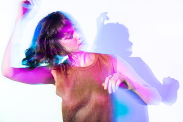 Young woman in vibrant double exposure effect