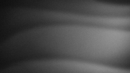 A minimalistic abstract background with soft black and gray gradients, featuring a subtle grainy texture. Ideal for wallpapers, banners, and professional backdrops