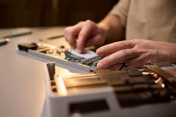 Hand Repairing a Graphics Card through the Application of Thermal Paste for Better Performance