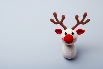 Christmas background with fabric reindeer toy for the Christmas holidays