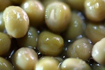 Macro shot of processed peas in the can