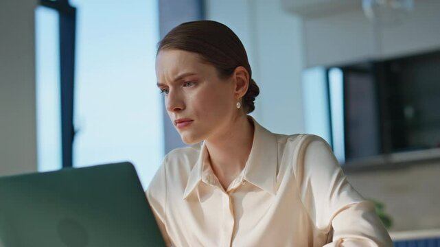 Focused woman examining documentation working at corporate workplace closeup. 