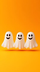 Fototapeta premium Halloween ghosts with funny pumpkin on orange background. Happy halloween holiday concept