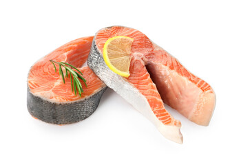 Two fresh salmon steaks, lemon and rosemary isolated on white