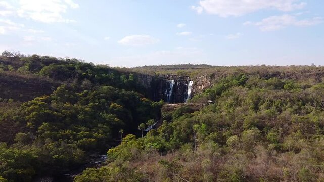 Salto Corumb&aacute; waterfall with crystal clear waters in the middle of the forest in the Brazilian cerrado, Brazil