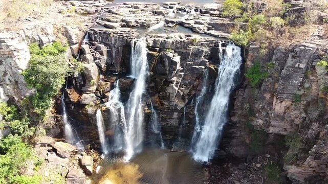 Salto Corumb&aacute; waterfall with crystal clear waters in the middle of the forest in the Brazilian cerrado, Brazil