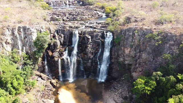 Salto Corumb&aacute; waterfall with crystal clear waters in the middle of the forest in the Brazilian cerrado, Brazil