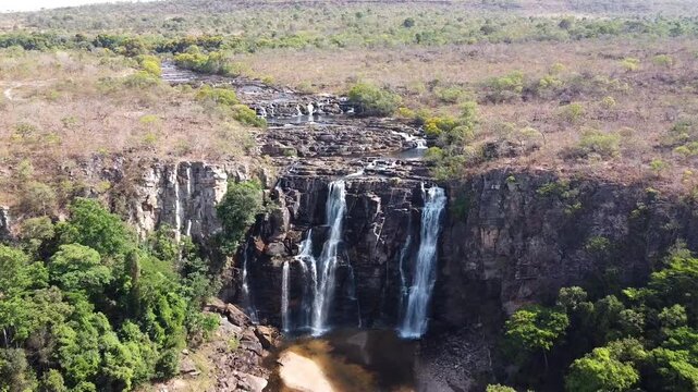 Salto Corumb&aacute; waterfall with crystal clear waters in the middle of the forest in the Brazilian cerrado, Brazil
