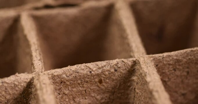 empty cardboard cups for seedlings. made from recycled paper with the addition of peat, a paper cup for seedlings