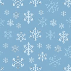 Elegant abstract winter snowflake vector pattern on a frosty pale blue background creating a festive repeating Christmas holiday texture.