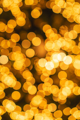 Round yellow lights bokeh at night time, Abstract background.