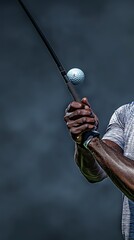Close-up of golfer preparing to hit the ball with precision