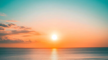 A vibrant sunset over a calm ocean with a soft, colorful sky.