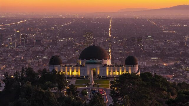 American tourist attraction Griffith Observatory cityscape at night in Los Angeles.Timelapse photograph