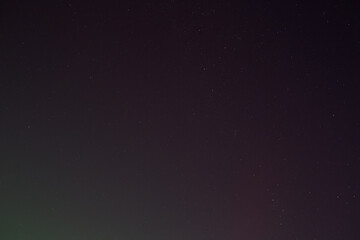 Night sky aurora photograph. Colorful northern lights landscape. 