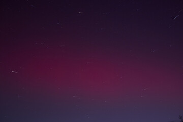 Night sky aurora photograph. Colorful northern lights landscape. 