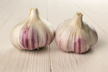 Fresh Organic Garlic Bulbs on Wooden Surface - Rustic Kitchen Ingredient