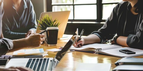 A diverse group of people sitting together, actively discussing ideas and strategies, embodying the essence of teamwork as they exchange insights and collaborate.