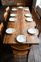 Fototapeta premium Empty dining table set for a meal