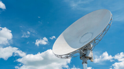 A satellite dish receives a digital signal from a telecommunications satellite that orbits the Earth. This technology enables broadcasting from space.