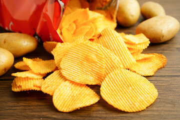 Potato chips , delicious BBQ seasoning spicy for crips, thin slice deep fried snack fast food.