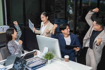 financial asian advisor showing plan of investment to clients in the consultancy office.