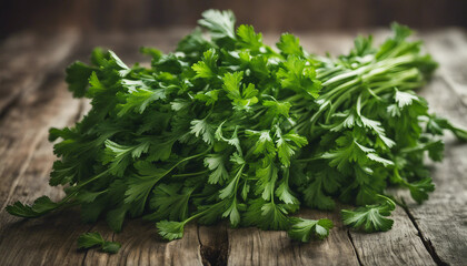 Obraz premium Freshly picked parsley on a weathered wooden table, showcasing vibrant greens.