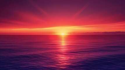 Fototapeta premium Stunning sunset over the ocean with vibrant red and purple hues, creating a serene and captivating view of the horizon and calm waters.