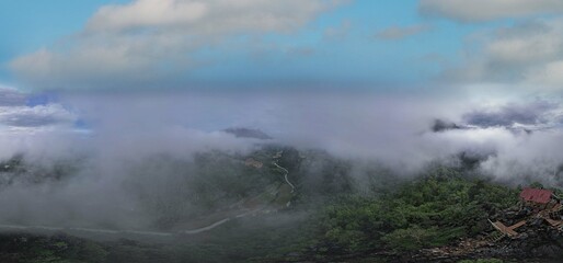 Mountain landscape in the fog.Beautiful sunlight and fog