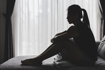 Silhouette of a woman with symptoms of depression and depression, Sadness, Anxiety, Family...