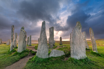 The ancient standing stones of Callanish (or Calanais) on Lewis in the Outer Hebrides of Scotland at sunset