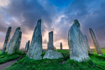 The ancient standing stones of Callanish (or Calanais) on Lewis in the Outer Hebrides of Scotland at sunset