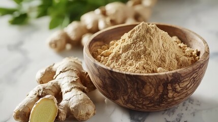 Fototapeta premium fresh ginger root and ground ginger powder in a wooden bowl