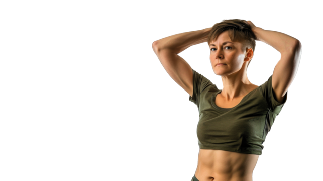 Sexy, young woman wearing part of an American soldiers uniform - camo pants.