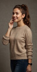 Fototapeta premium woman wearing a brown sweater 