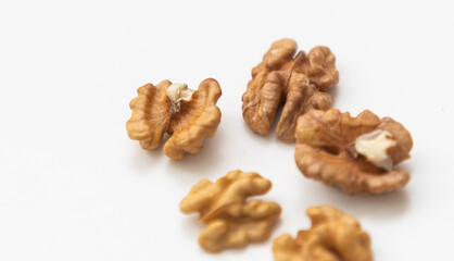 Half a walnut isolate. Peeled walnut on white. Walnut top view. Set with clipping path. Full depth of field