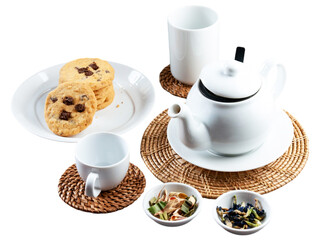 Cozy Tea Time: A serene setting for a comforting afternoon tea, featuring a classic white teapot, delicate teacups, and a plate of freshly baked cookies, all resting on a wicker coaster.  