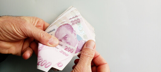 Background of Turkish lira. Turkish money. 50, 100 and 200 tl notes. Banner for website, desktop...