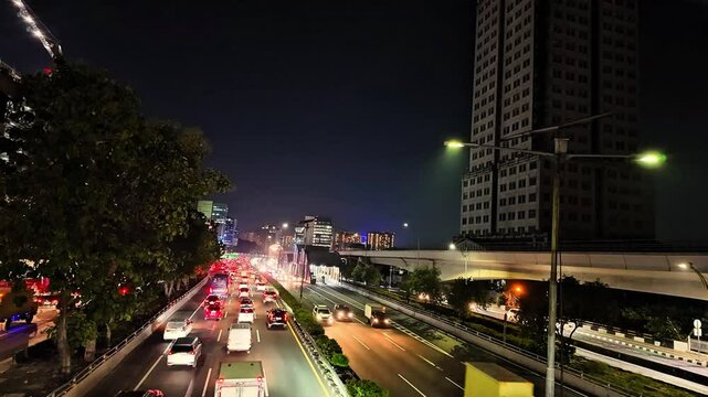 Traffic jam on a bustling city highway at night, 4K, 60 fps