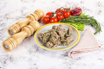 Fried turkey liver with herbs in cream sauce