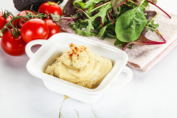 Creamy hummus in the bowl