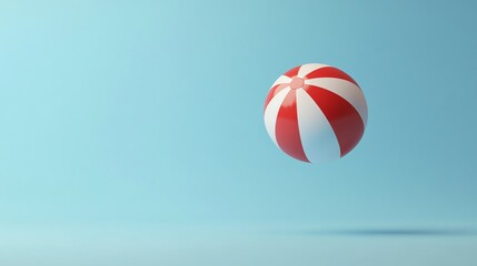 A red and white beach ball against a blue background.