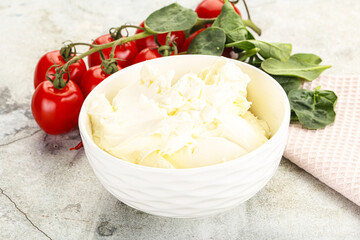 Soft cream cheese in the bowl