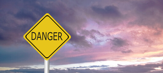 Hurricane Idalia warning sign against a powerful stormy background with copy space. Dirty and angled sign with cyclonic winds add to the drama.hurricane season sign on cloudy background