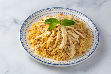 Bulgur pilaf with chicken and noodles - Turkish name; sehriyeli tavuklu bilgur pilavi