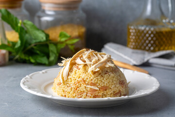 Bulgur pilaf with chicken and noodles - Turkish name; sehriyeli tavuklu bilgur pilavi
